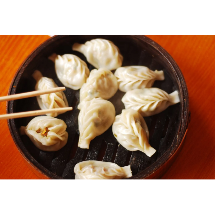 Dumplings Chinois faits maison : Découvrez cette recette authentique pour des bouchées savoureuses et pleines de saveurs